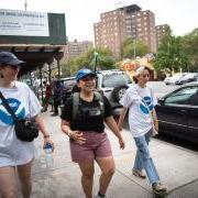 Researchers walk the streets of New York City taking air quality readings from a backpack